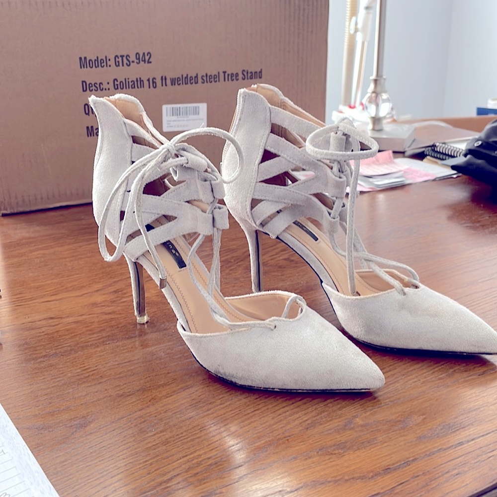 Soft material lace up heels